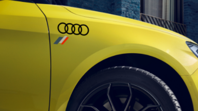 https://www.carat-garage.de/images/stories/virtuemart/product/Audi_original_Aufkleber_Sticker_heritage_Flagge_Ringe_Logo_1.png